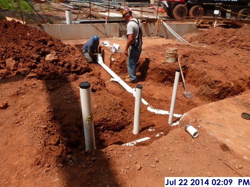 Installing the underground piping at Men's Room 133 Facing North (800x600)